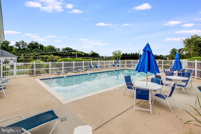 14 Doolin Ln, Rehoboth Beach, DE 19971 - community pool featuring a patio area