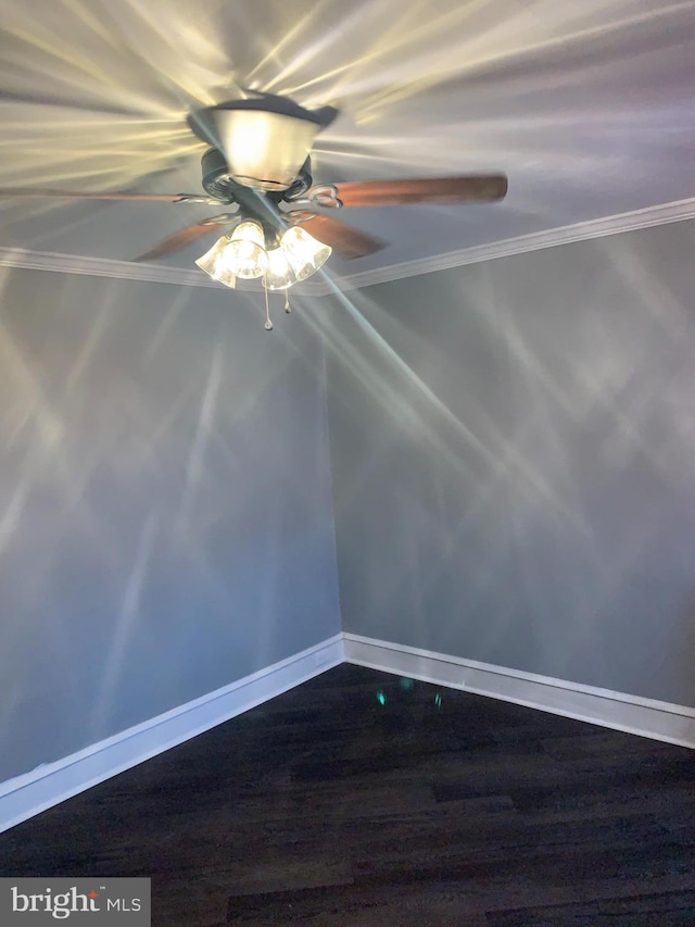 6370 Marsden St, Philadelphia, PA 19135 - empty room with a ceiling fan, dark wood-style flooring, and ornamental molding
