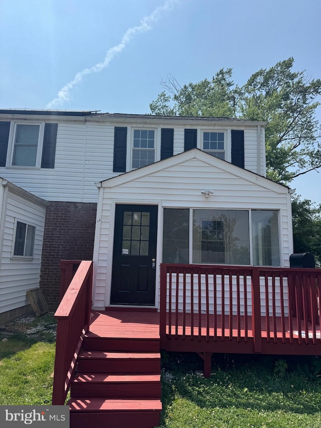 6016 N Kings Hwy, Alexandria, VA 22303 - view of front of house featuring a sunroom and a wooden deck