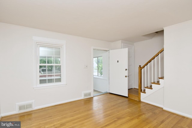 6016 N Kings Hwy, Alexandria, VA 22303 - foyer entrance featuring light wood-style flooring and stairs