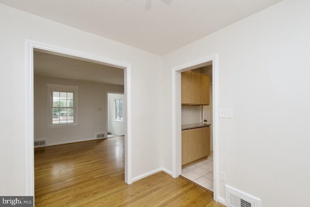 6016 N Kings Hwy, Alexandria, VA 22303 - hall with light wood-type flooring and baseboards