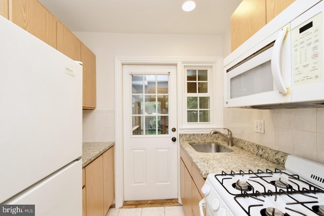 6016 N Kings Hwy, Alexandria, VA 22303 - kitchen featuring white appliances, backsplash, light brown cabinetry, light stone counters, and recessed lighting
