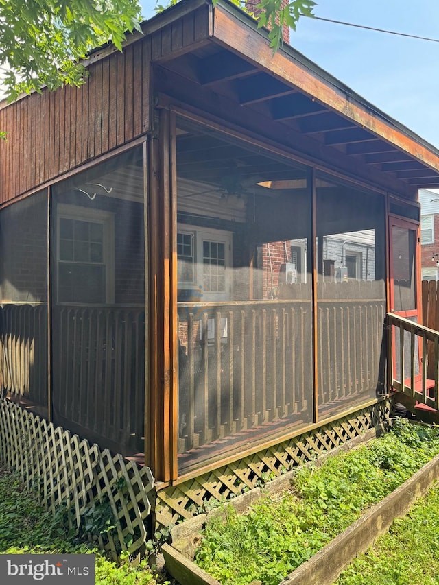 6016 N Kings Hwy, Alexandria, VA 22303 - view of home's exterior featuring a sunroom and a garden