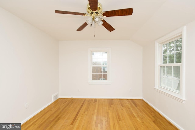 6016 N Kings Hwy, Alexandria, VA 22303 - unfurnished room featuring light wood-style flooring, a ceiling fan, and lofted ceiling