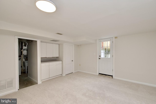 6016 N Kings Hwy, Alexandria, VA 22303 - basement with light colored carpet and baseboards