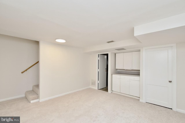 6016 N Kings Hwy, Alexandria, VA 22303 - finished below grade area featuring light carpet and stairs