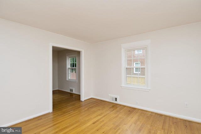6016 N Kings Hwy, Alexandria, VA 22303 - empty room with light wood finished floors and healthy amount of natural light