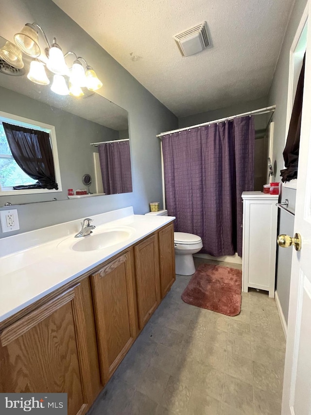 103 N W St, Harrington, DE 19952 - bathroom with vanity, a textured ceiling, curtained shower, and a chandelier