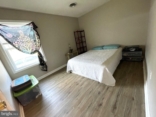 103 N W St, Harrington, DE 19952 - bedroom featuring wood finished floors