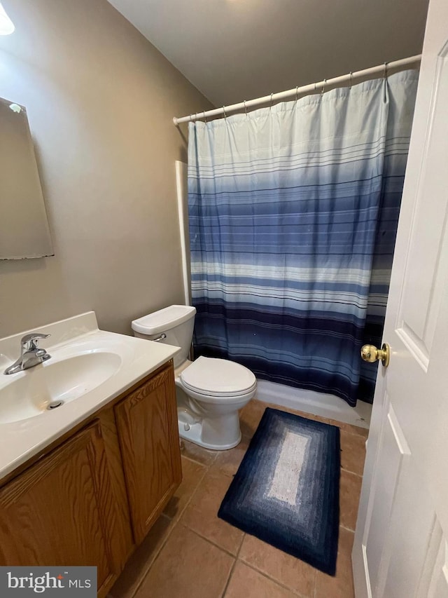 103 N W St, Harrington, DE 19952 - bathroom featuring tile patterned floors and vanity