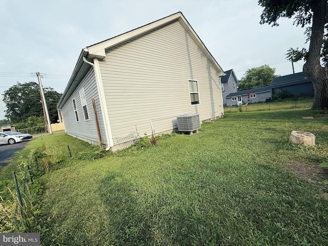 103 N W St, Harrington, DE 19952 - view of side of home featuring a central AC unit