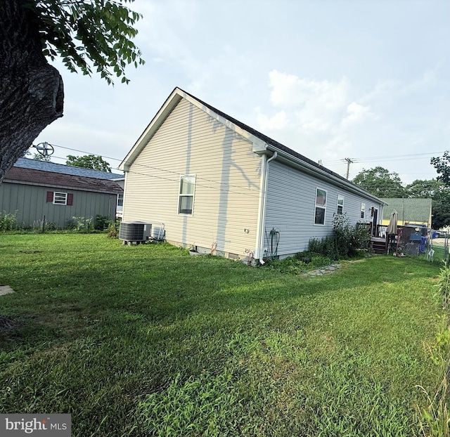 103 N W St, Harrington, DE 19952 - view of side of property with a yard and a deck