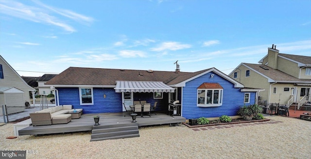 813 Forepeak Dr, Forked River, NJ 08731 - back of property with a wooden deck and an outdoor hangout area