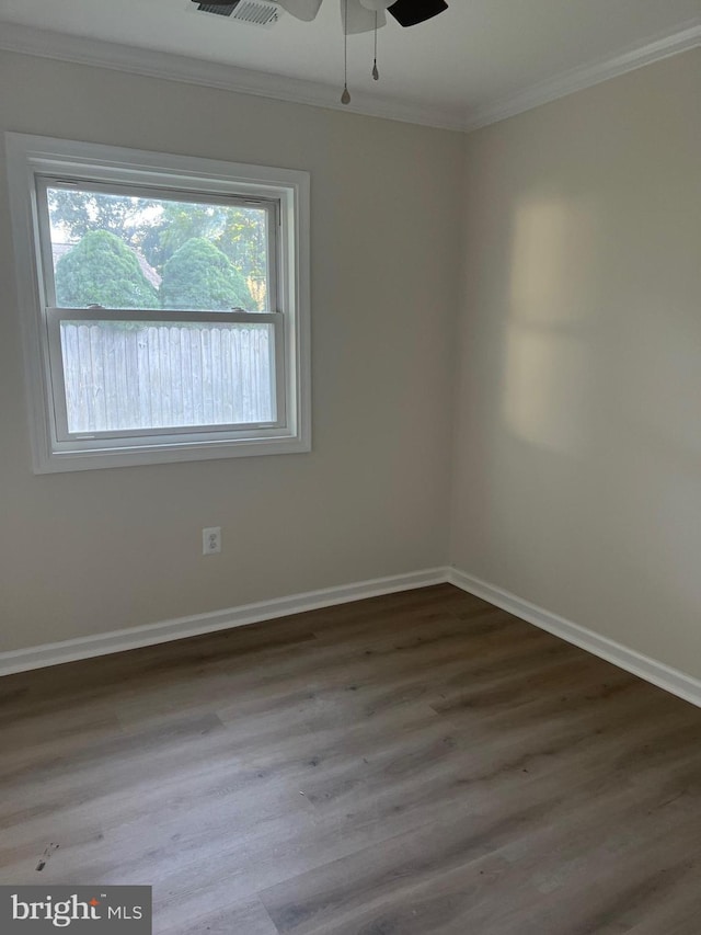 14503 Melbourne Ave, Woodbridge, VA 22191 - empty room with crown molding, wood finished floors, and ceiling fan