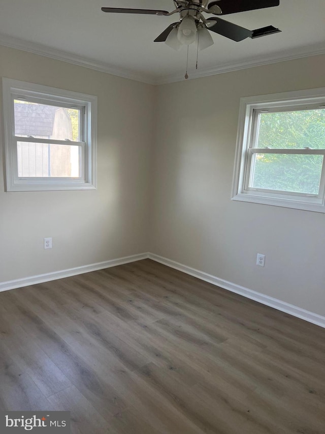 14503 Melbourne Ave, Woodbridge, VA 22191 - spare room featuring ornamental molding, healthy amount of natural light, wood finished floors, and ceiling fan
