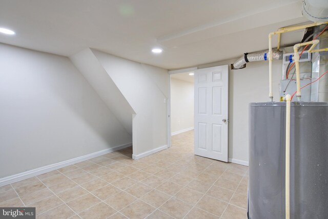 3549 Horton Ave, Baltimore, MD 21225 - finished basement featuring water heater, recessed lighting, and tile patterned flooring