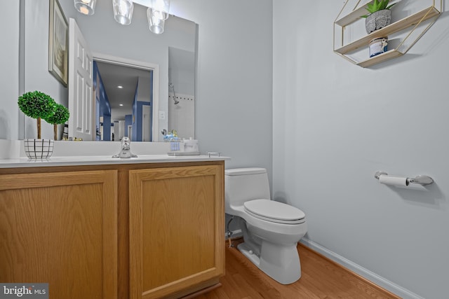 734 Wood Duck Ct, Middletown, DE 19709 - bathroom featuring wood finished floors and vanity