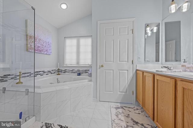 734 Wood Duck Ct, Middletown, DE 19709 - bathroom with a garden tub, double vanity, a stall shower, lofted ceiling, and marble finish floors