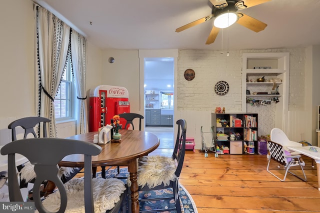 246 Marietta Ave, Mount Joy, PA 17552 - dining space with light wood-type flooring, a ceiling fan, and built in shelves