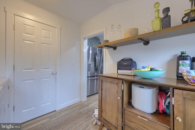 246 Marietta Ave, Mount Joy, PA 17552 - kitchen featuring stainless steel fridge, open shelves, ornamental molding, and light wood-type flooring