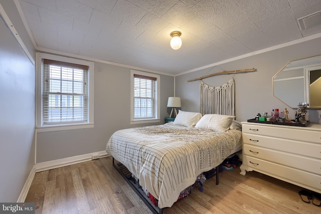 246 Marietta Ave, Mount Joy, PA 17552 - bedroom with wood finished floors and ornamental molding