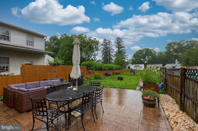 246 Marietta Ave, Mount Joy, PA 17552 - fenced backyard with a patio, outdoor dining area, and an outdoor hangout area