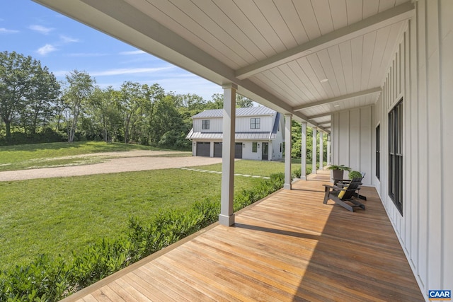310 Goodloe Ln, Afton, VA 22920 - wooden terrace with gravel driveway, a lawn, and view of wooded area