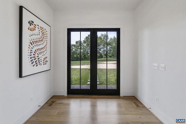 310 Goodloe Ln, Afton, VA 22920 - entryway with light wood-style floors and french doors