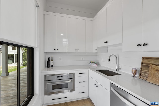 310 Goodloe Ln, Afton, VA 22920 - kitchen with appliances with stainless steel finishes, white cabinets, light countertops, and modern cabinets