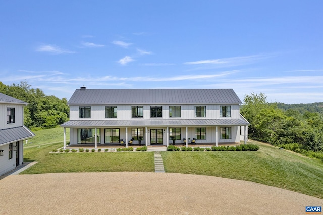 310 Goodloe Ln, Afton, VA 22920 - modern inspired farmhouse with a porch, a front lawn, a metal roof, and a standing seam roof