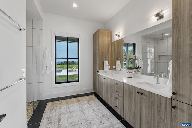 310 Goodloe Ln, Afton, VA 22920 - bathroom with double vanity, tiled shower, tile patterned floors, and recessed lighting