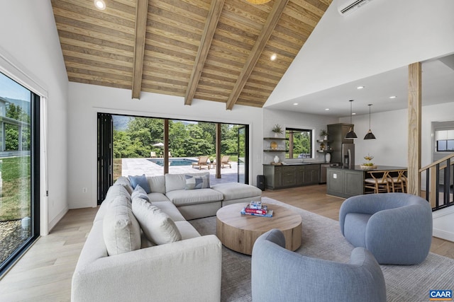 310 Goodloe Ln, Afton, VA 22920 - living room with light wood finished floors, high vaulted ceiling, a wood ceiling with exposed beams, and recessed lighting