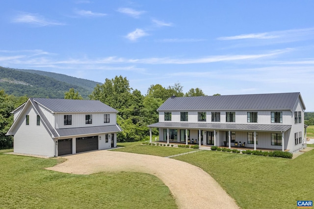 310 Goodloe Ln, Afton, VA 22920 - modern inspired farmhouse featuring covered porch, a front lawn, and a metal roof