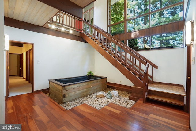 709 Springloch Rd, Silver Spring, MD 20904 - staircase featuring hardwood / wood-style floors and wooden ceiling