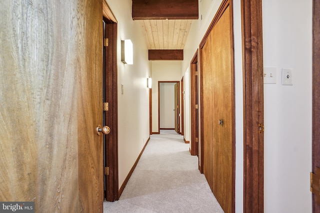 709 Springloch Rd, Silver Spring, MD 20904 - corridor featuring light colored carpet and a wooden ceiling with exposed beams