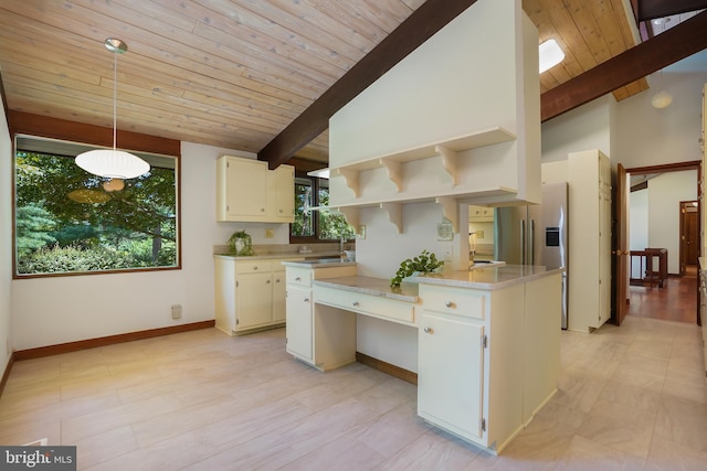 709 Springloch Rd, Silver Spring, MD 20904 - kitchen with stainless steel fridge, light countertops, wooden ceiling, open shelves, and hanging light fixtures