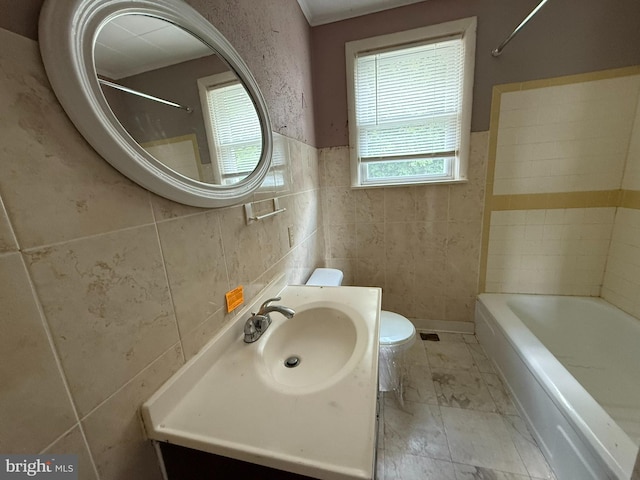 2865 Chambersburg Rd, Gettysburg, PA 17325 - bathroom with tile walls, vanity, and a wainscoted wall