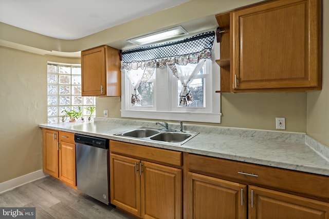 34 Harvard Rd, Hagerstown, MD 21742 - kitchen featuring stainless steel dishwasher, light wood-type flooring, and brown cabinets