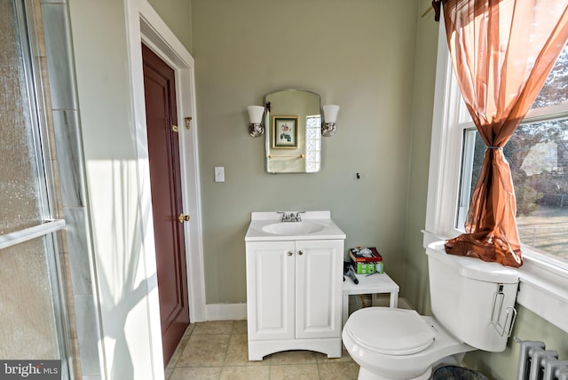 34 Harvard Rd, Hagerstown, MD 21742 - bathroom featuring vanity, radiator, and tile patterned floors