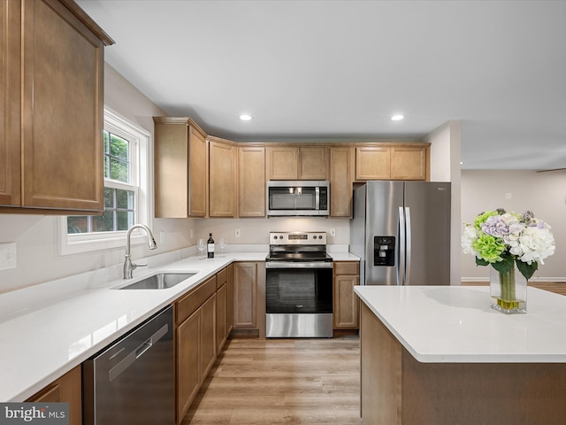 564 Great Oak Ct, Woodstock, VA 22664 - kitchen featuring appliances with stainless steel finishes, light wood-style flooring, recessed lighting, and light countertops
