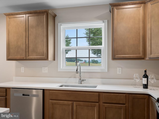 564 Great Oak Ct, Woodstock, VA 22664 - kitchen with dishwasher, light countertops, and brown cabinetry