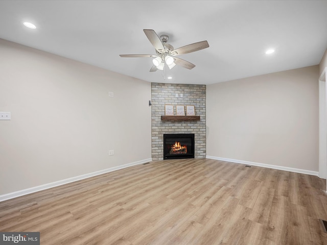 564 Great Oak Ct, Woodstock, VA 22664 - unfurnished living room with a ceiling fan, light wood finished floors, recessed lighting, and a fireplace