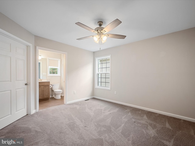 564 Great Oak Ct, Woodstock, VA 22664 - unfurnished bedroom featuring light colored carpet, ensuite bath, and ceiling fan