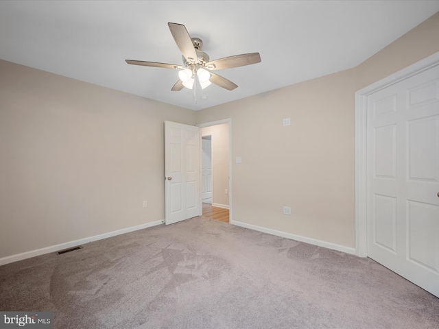 564 Great Oak Ct, Woodstock, VA 22664 - unfurnished bedroom with light colored carpet and a ceiling fan