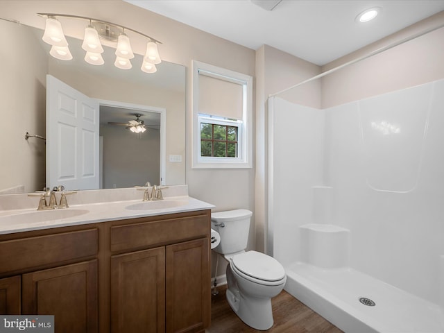 564 Great Oak Ct, Woodstock, VA 22664 - bathroom featuring wood finished floors, double vanity, and a shower