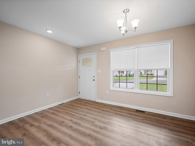 564 Great Oak Ct, Woodstock, VA 22664 - entryway with a chandelier and wood finished floors