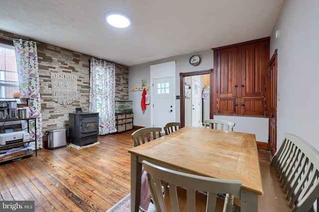 305 N Market St, Elizabethtown, PA 17022 - dining room featuring a wood stove, hardwood / wood-style floors, and healthy amount of natural light
