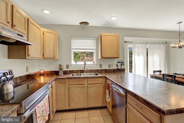 309 Lincoln Ave, Harrisburg, PA 17111 - kitchen with appliances with stainless steel finishes, under cabinet range hood, a peninsula, dark countertops, and light brown cabinets