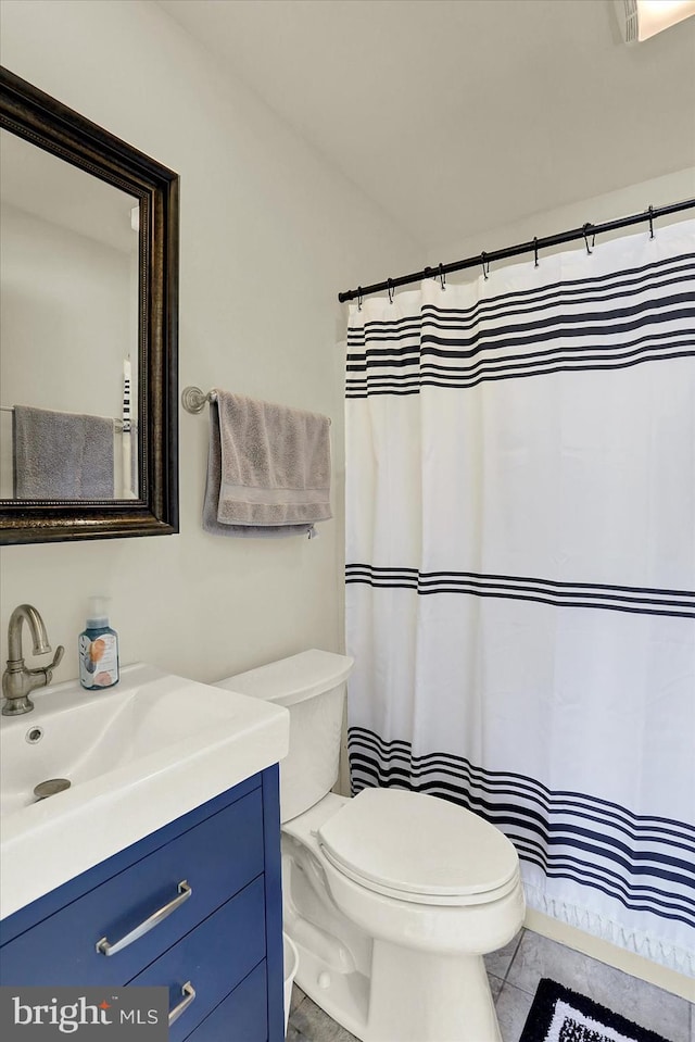 309 Lincoln Ave, Harrisburg, PA 17111 - bathroom with vanity, tile patterned floors, and a shower with curtain
