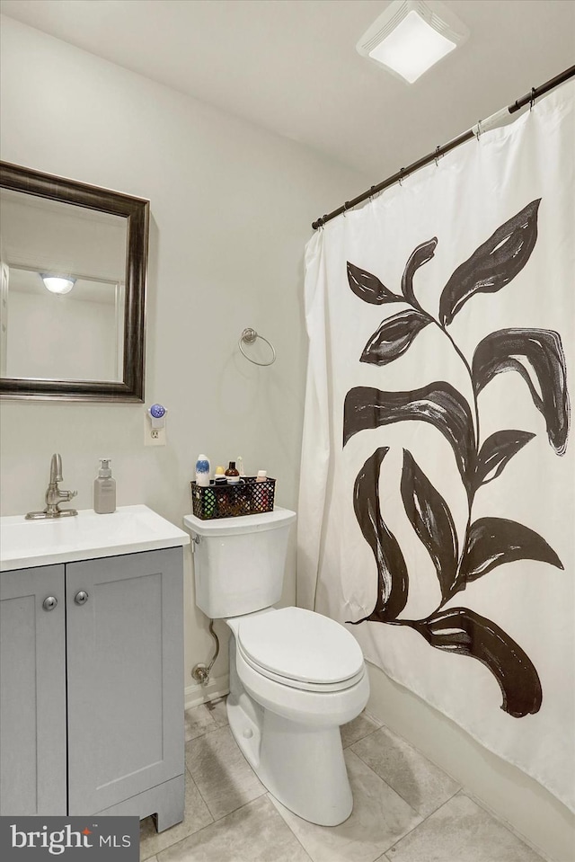309 Lincoln Ave, Harrisburg, PA 17111 - full bathroom with tile patterned floors, vanity, and curtained shower